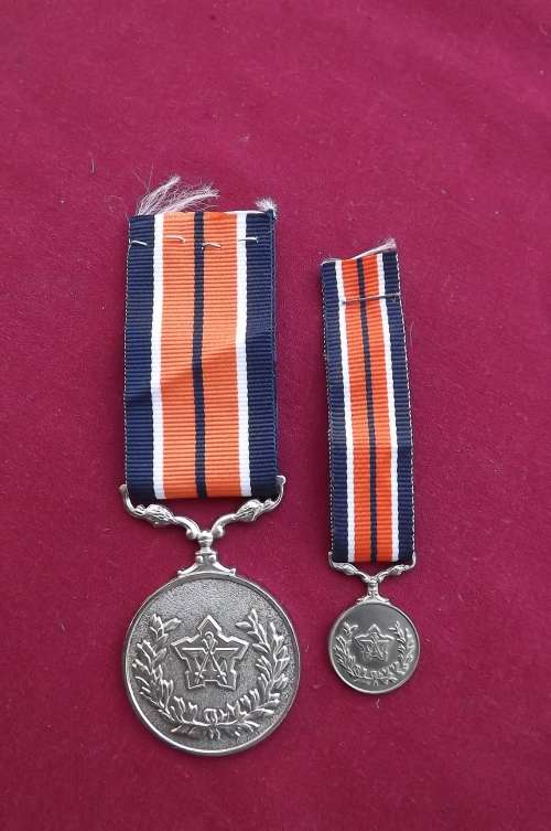 SADF General Service medal with miniature medal.Both with ribbons No 038751.In good condition