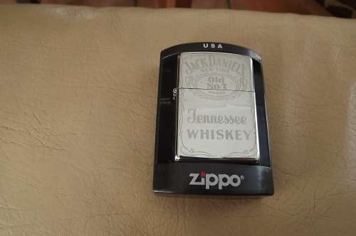 Zippo windproof lighter - Jack Daniels Whiskey design silver toned.Guarantee document included.