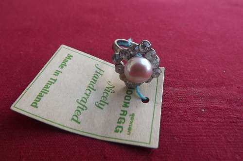 Beautiful handcrafted rhodium plated size 6 ring with genuine pearl and zirconias new.Never worn