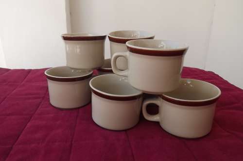 Set of 8 porcelain cups without saurcers made in China.As new