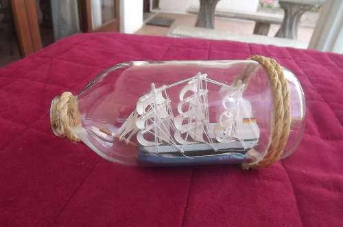 "Ship in a bottle" height 18cm. Corked. In good condition