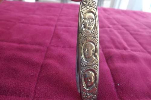 Antique pocket knife with faces of 6 SA Union president.In brass from Botha 1910 to Verwoerd 1960