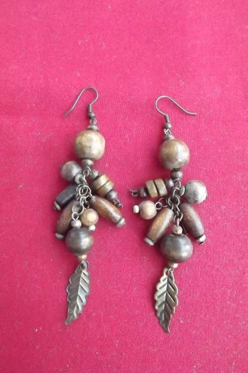 Pair of wooden ethnic earrings in dangling style.For pierced ears.Good condition