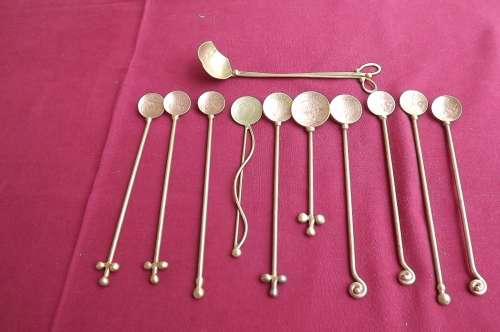 Lot of 10 handmade brass spoons.Made with 2c,half pennies and 1 penny.Plus 1 sugar spoon.
