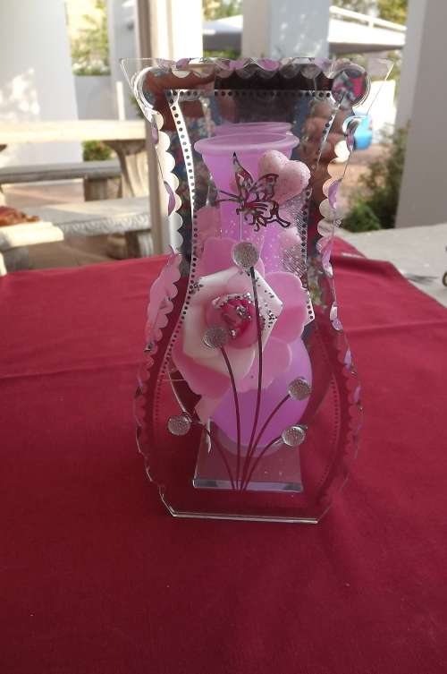 Ornament with pink flower vase.20cm high.Mirror at back with flower and perspex on front