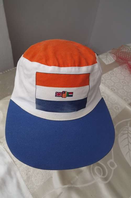 Men's cap with old SA flag on front.Used but in good condition.