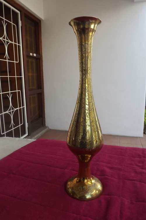 Tall embossed brass vase from India.In new condition.Height 41cm