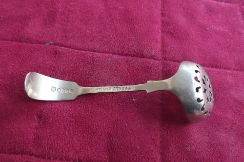 Antique small perforated ladle spoon in Nevada silver D + A.Length 11cm.Diameter 3.8cm