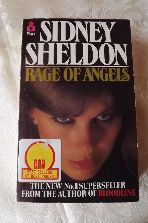Book-Rage of angels.The  fast moving plot...with new surprises on every page..by Sidney Sheldon