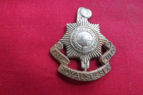 The Royal Sussex.Regiment badge.Repaired at back.
