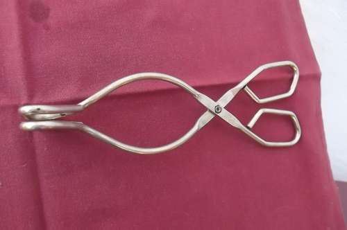 Tong for fries or ice made in England.Length 19cm