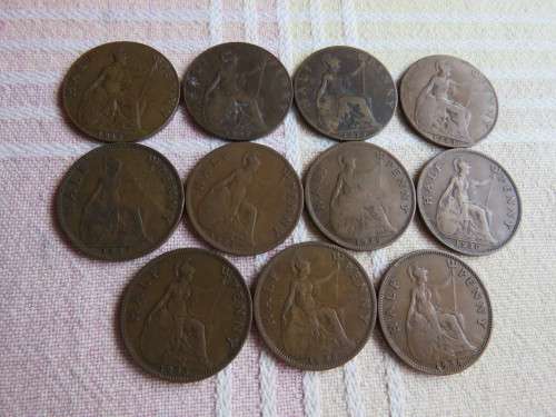 Lot of 11 'ANTIQUE British  GEORGIVS V' half penny coins dated from 1915-1936,All in good condition.