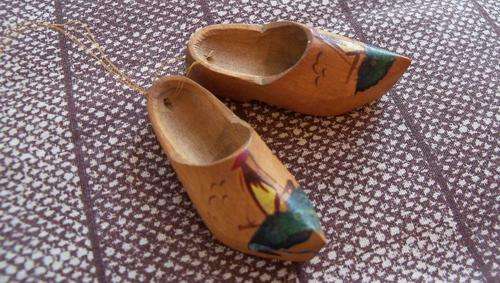 Pair of very small wooden shoes