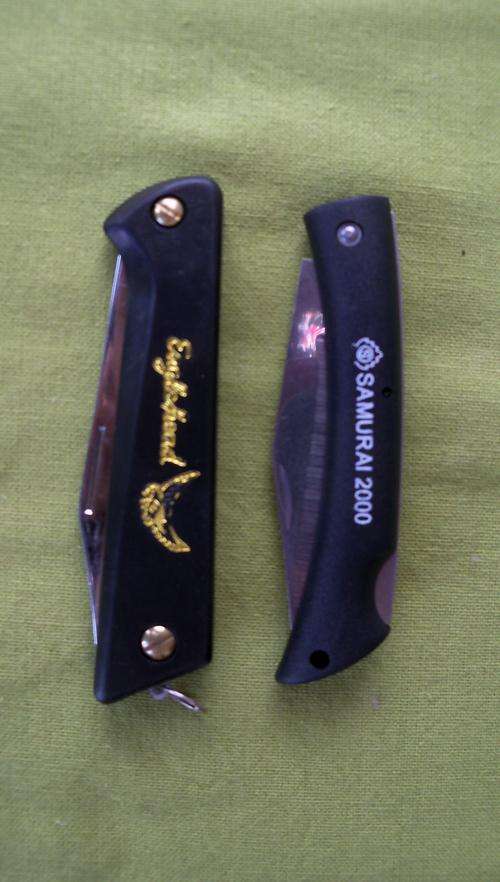 Lot of 2  different knives as per scan