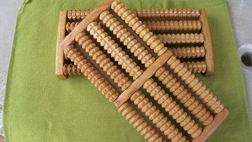 2 x wooden foot massagers with rollers
