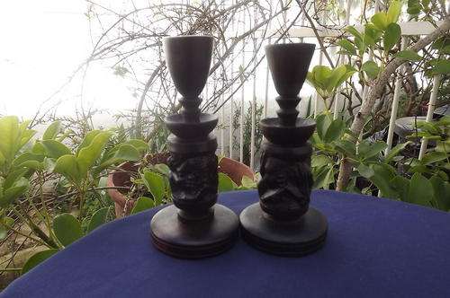 Pair of wooden carved candle holders - height 16.5cm