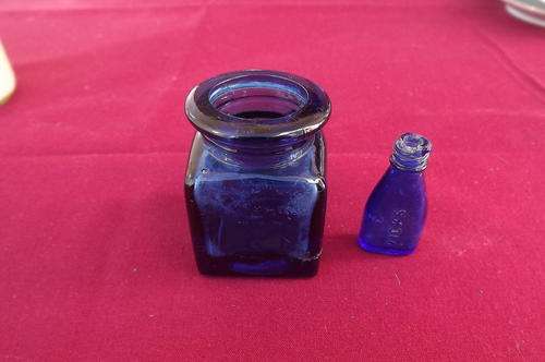 Pair of Antique blue bottles - small one a Vicks bottle