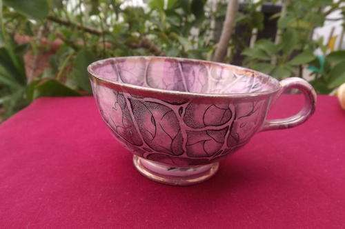 Single loose pink cup as per scan