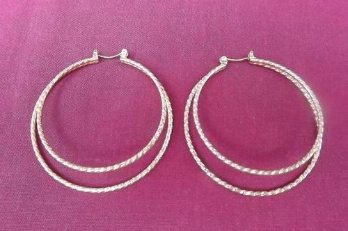 Pair of Gold Piercing Earrings