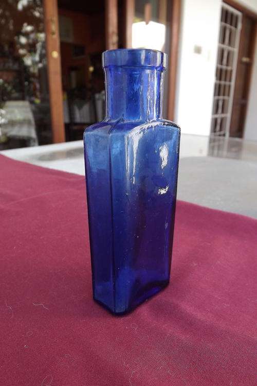 Blue Bottle in good condition - 10.75cm high