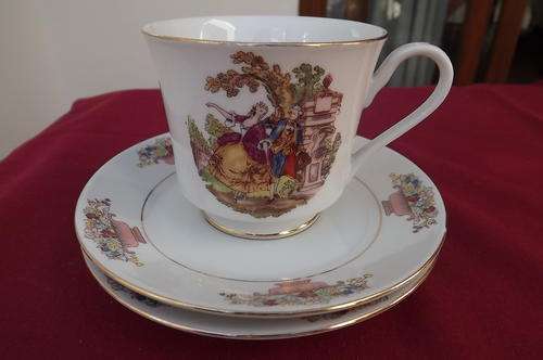 Porcelain Cup & 2 Saucers from China with pretty pattern - good condition