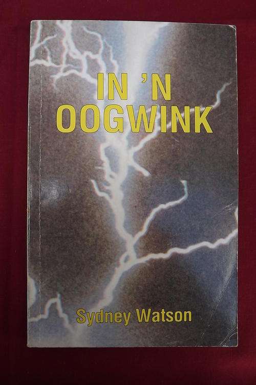 Book - In 'n Oogwink deur Sydney Watson