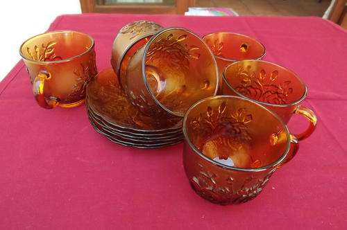 Set of 6 Amber Glass Cups & Saucers from Indonesia in as new condition!