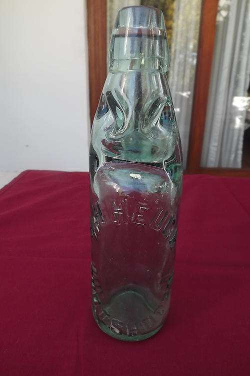 Antique Soda Bottle with Marble-HH Heugh Oudtshoorn made by Niagara Bottle Barnett & Foster Makers