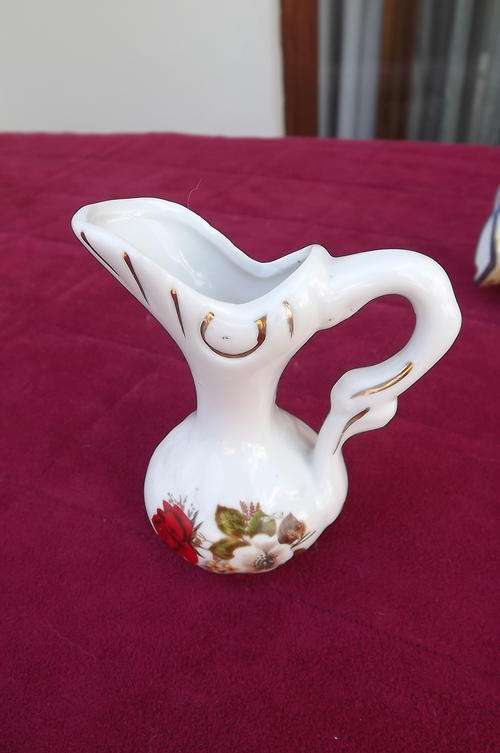 Small Porcelain Jug with Floral Design and some Gilding - good condition - height 8cm