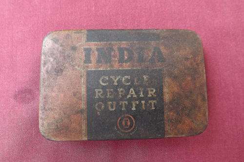 Red vintage India Cycle Repair Outfit Tin.On lid inside is full instructions.Need cleaning.Rusty