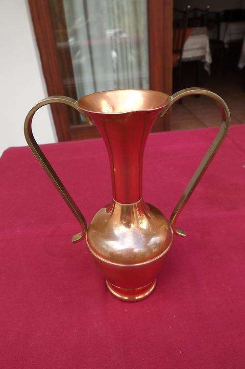 Copper vase with brass handles.17.25 cm tall