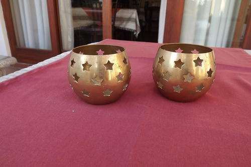 Set of 2 round brass candle holders with cut-out star pattern - height 6.5 cm