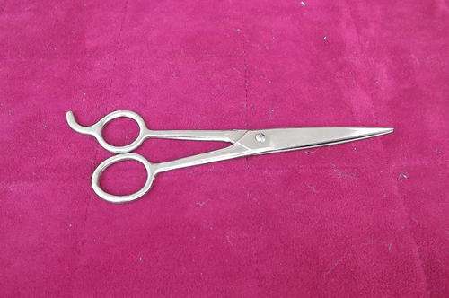 Hairdressers steel scissors made in USA. Length 16.5 cm. Good condition