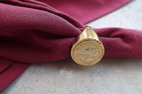 Bulky ring with coin imprint.Size10.5.Very good condition