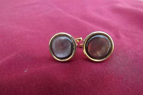 Stylish pair of round cufflinks with stone fronts.As new