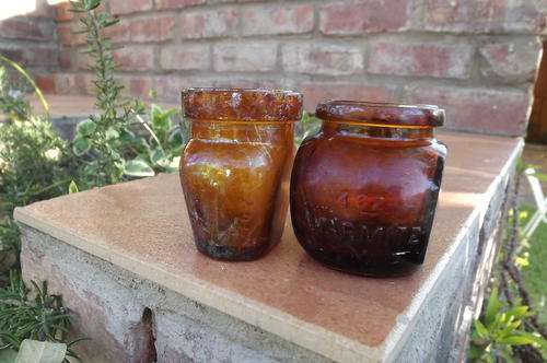 Lot of 2 different vintage Marmite bottles.Good condition