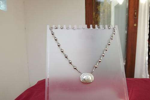 Estee Lauder Moonsilver Pendant chain necklace with solid perfume compact.