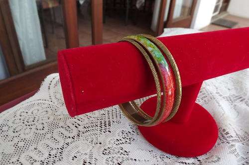 Set of 3 pretty brass bangles - middle one with green and coral top layer. Diameter 6.8 cm.