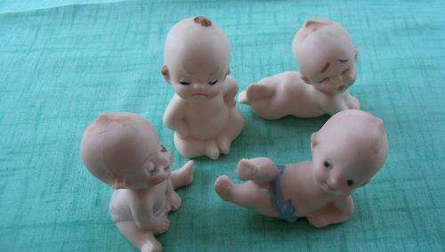 Set of 4 Ceramic Cupid Dolls