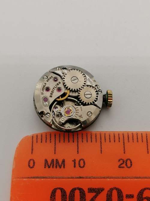## Breitling Swiss perfection, Ladies wind up inner working watch, movement only, spare parts? ##