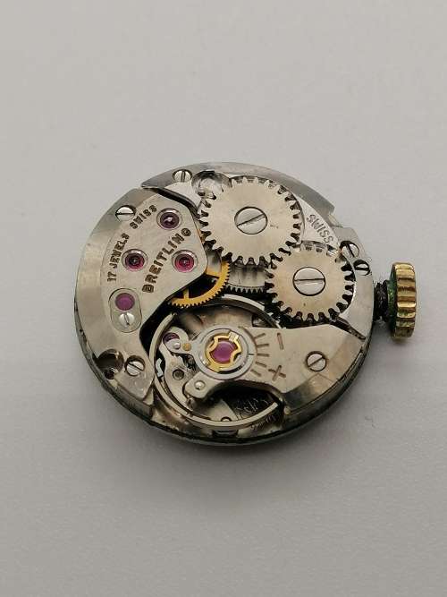 ## Breitling Swiss perfection, Ladies wind up inner working watch, movement only, spare parts? ##