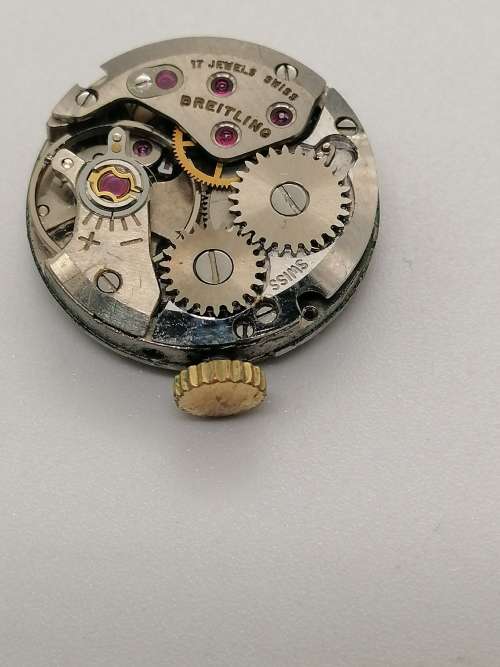 ## Breitling Swiss perfection, Ladies wind up inner working watch, movement only, spare parts? ##