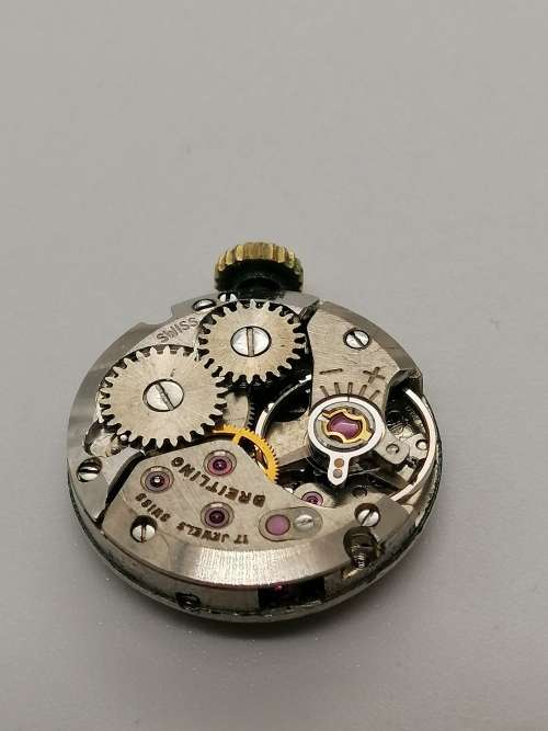 ## Breitling Swiss perfection, Ladies wind up inner working watch, movement only, spare parts? ##