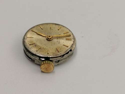 ## Breitling Swiss perfection, Ladies wind up inner working watch, movement only, spare parts? ##