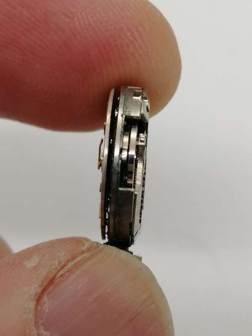 ## Breitling Swiss perfection, Ladies wind up inner working watch, movement only, spare parts? ##