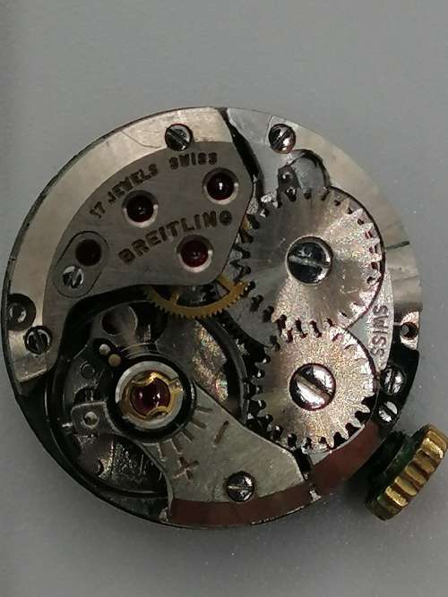 ## Breitling Swiss perfection, Ladies wind up inner working watch, movement only, spare parts? ##