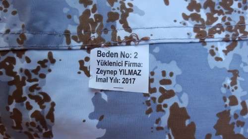 handy Turkish army issue reversible snow/ brown nylon poncho and sleeves/ gaitors - survival kit