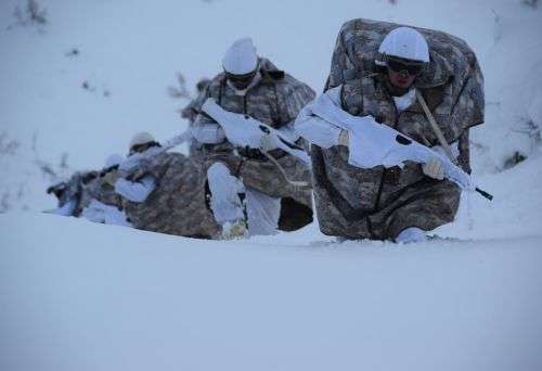 handy Turkish army issue reversible snow/ brown nylon poncho and sleeves/ gaitors - survival kit