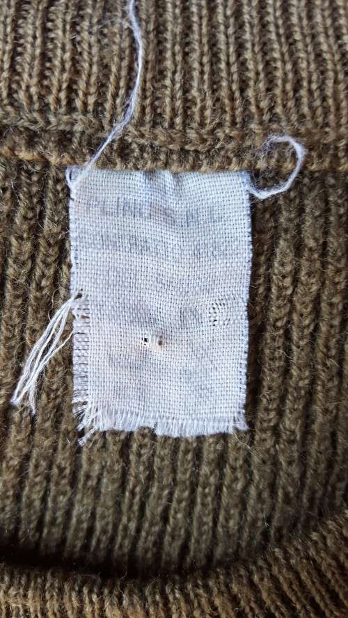 International (Spanish?) khaki Military style jersey/ jumper (wool) in very good used condition Med