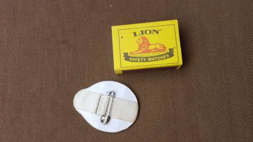 very VERY rarely seen period original MPLA pin-on plastic badge in great used condition